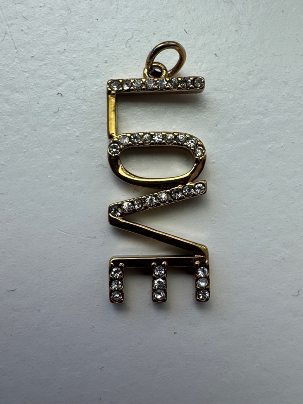Gold Crystal 'LOVE' Pendant Necklace Charm. 1” in length.